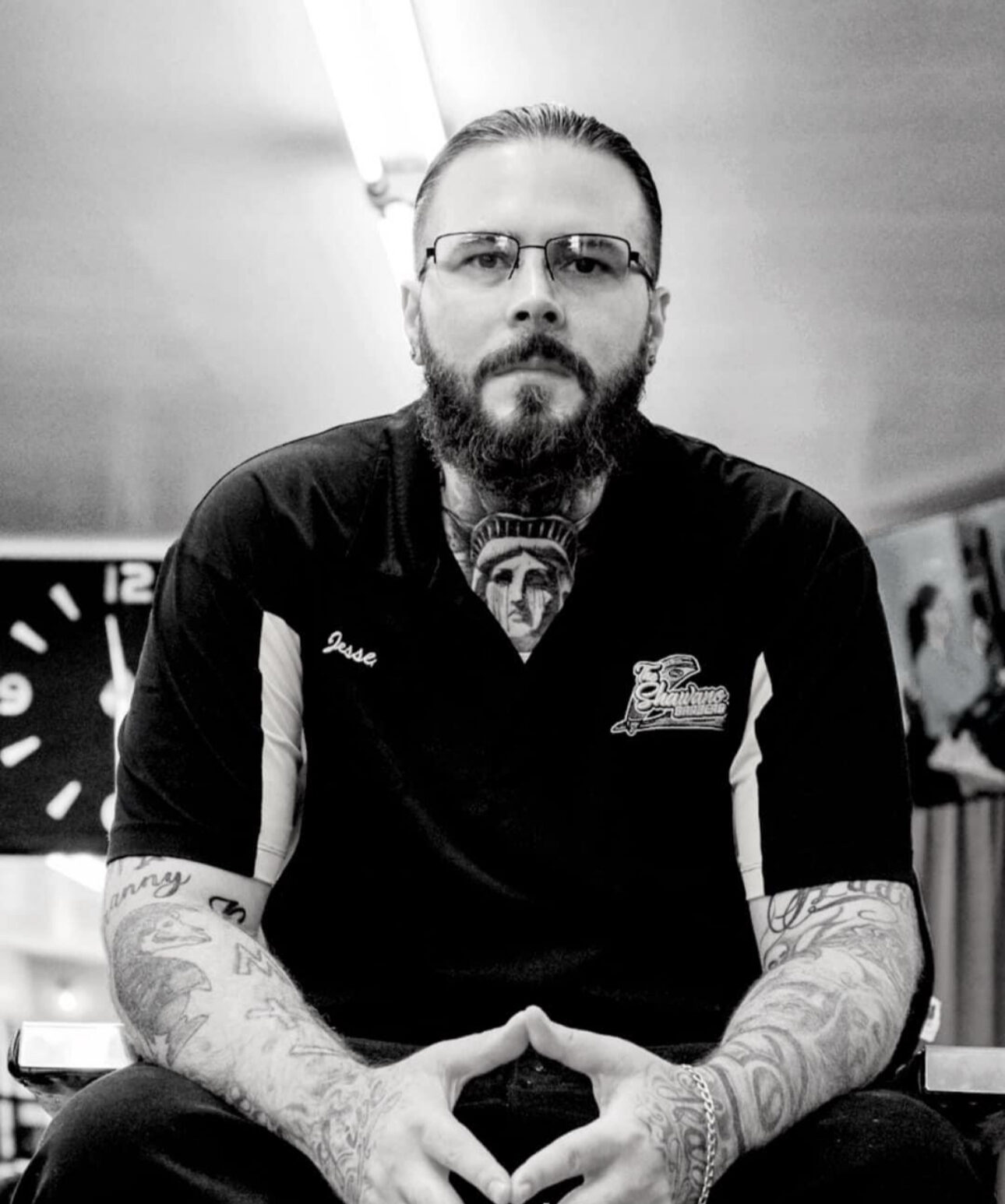 Jesse Krajenka, owner and barber, in the shop